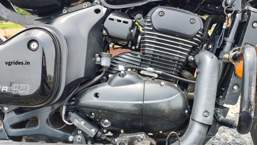 Jawa 42 Bobber is powered by a334 cc single cylinder liquid cooled engine
DOHC setup
29.9 ps
30 nm
Dual exhaust system
185 kg weight
12.5 liters
1485 wheelbase
Seat height low 740 mm
6-speed gearbox
Dual channel ABS
280 mm front and 240 mm rear disc sizes
10090 R18 at the front and 14070 R17 at the rear