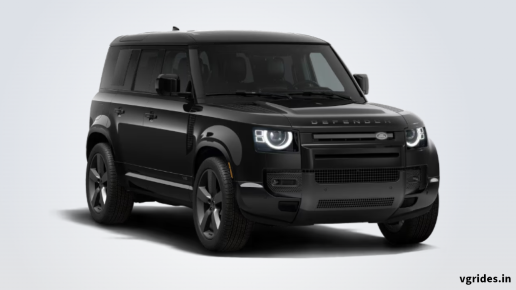 2025 Land Rover Defender V8 with a sleek body-colored panoramic roof and LED headlights, showcasing its rugged yet elegant design